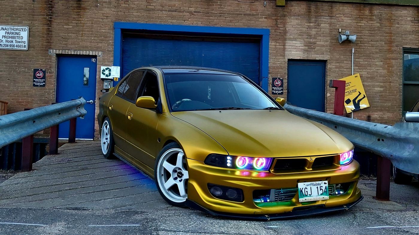 Gold Mitsubishi Galant with custom lighting